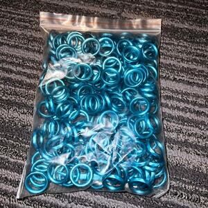 Turquoise metallic plastic circles for jewelry, crafting and art projects